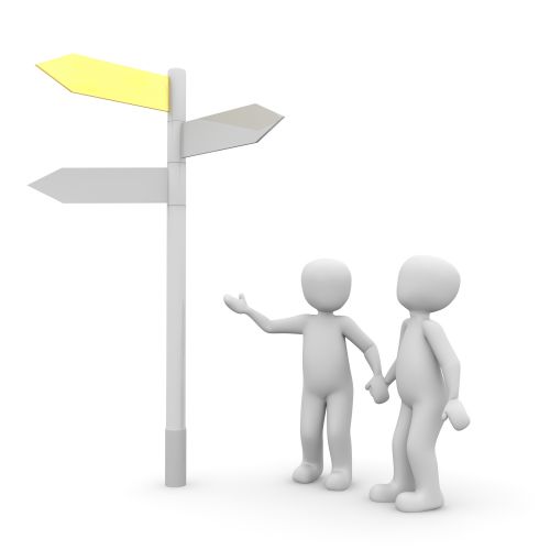 boneco ajudando outro a chegar a um destino